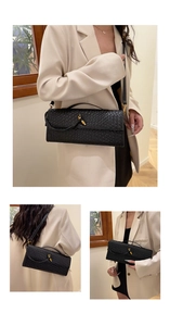 Détail du sac bandoulière tissé noir avec fermoir doré et texture en cuir élégante