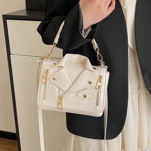 White moto jacket style shoulder bag with gold rivets and textured faux leather finish