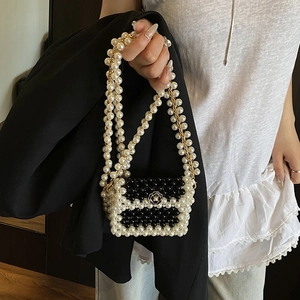 Mini woven pearl beaded handbag for women with camellia flower and gold chain strap
