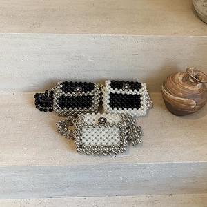 Mini woven beaded crossbody bags with pearl chains and camellia decor in three colors