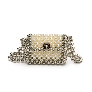 Mini woven crossbody bag with pearls and silver beads featuring a camellia flower charm