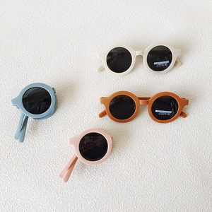 Foldable matte round frame kids polarized sunglasses in various pastel colors