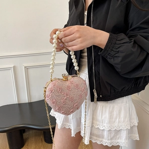 Pink lace heart-shaped evening bag with 3D roses, pearl handle and gold chain strap
