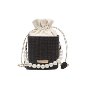 Mini pearl chain bucket bag with vintage monogram print and drawstring closure