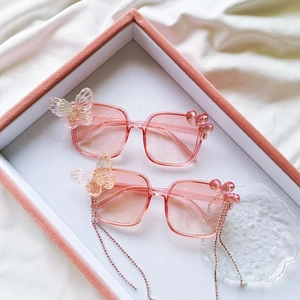 Lunettes de soleil roses avec nœud pour enfants et chaîne à pampilles en strass cœur