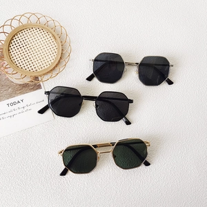 Three pairs of vintage octagonal metal frame sunglasses for kids in stylish colors