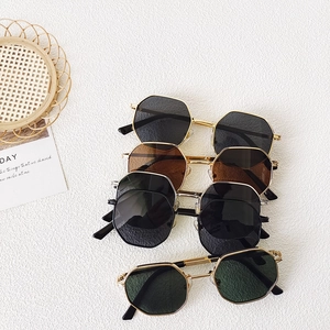 Kids vintage octagonal sunglasses with gold metal frames in four assorted lens colors