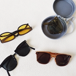 Gafas de sol plegables para niños con protección UV400 y estuche redondo con cremallera