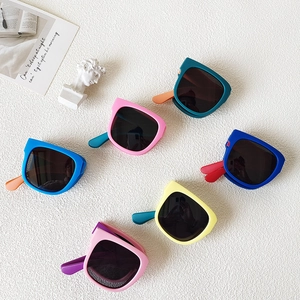 Foldable kids sunglasses in multiple matte colors with UV protection for boys and girls