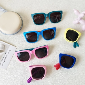 Foldable kids sunglasses with UV400 protection in various matte color combinations