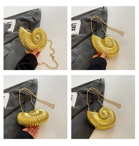 Detailed views of a gold conch-shaped acrylic shell evening bag with metal chain strap