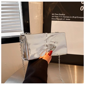 Silver mirror acrylic box bag with artistic folds and a thin metal chain strap