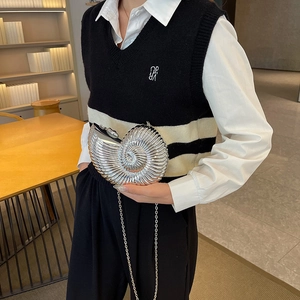 Chic silver seashell-shaped clutch bag with spiral texture and elegant chain strap