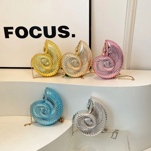 Chic conch shell acrylic evening clutch bag in metallic colors with chain strap