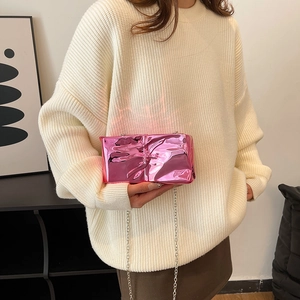 Metallic pink acrylic clutch bag with chain strap and crinkle texture for women