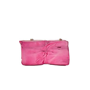 Pink mirror acrylic crossbody bag with artistic pleated design and metal chain rings