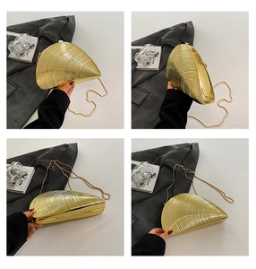 Detailed close-up views of the shell-shaped gold evening clutch with sleek metal texture