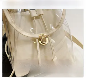 Detail of gold metal twist lock and clear PVC exterior on a sweet forest-style backpack