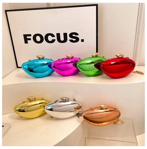 Detailed display of colorful mirror acrylic evening bags with metal chains in seven vibrant tones