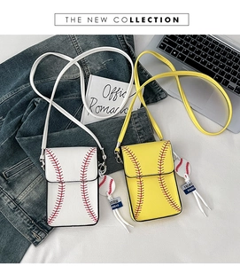 Detail of mini baseball crossbody bags in yellow and white with creative stitching and charms