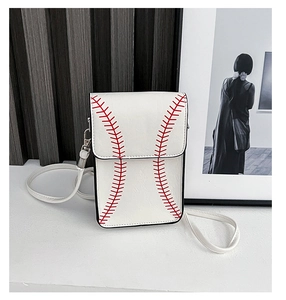 Detailed view of white baseball-themed crossbody bag with red stitching and slim strap