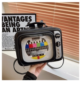 Dettaglio della borsa TV vintage con finestra trasparente e motivo segnale retrò