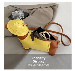 Capacity display of dog-shaped crossbody bag featuring smartphone and cosmetics inside