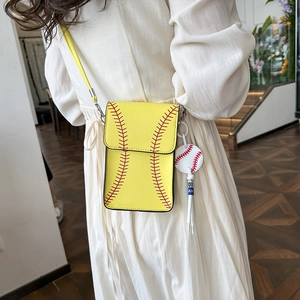 Lemon yellow baseball crossbody bag with red stitching and matching charm for women