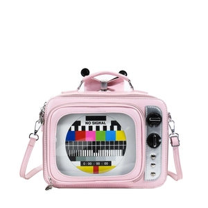 Retro TV shaped pink handbag with transparent window and decorative pink bow detail