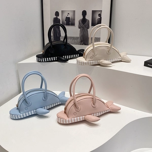 Creative dolphin-shaped shoulder bags in four colors with striped bottom details