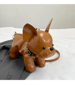 Detail of a brown French Bulldog cross-body bag with glossy PU finish and rivet collar
