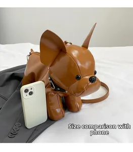 Puppy shaped crossbody bag size comparison with smartphone showing practical dimensions