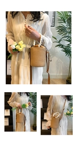 Close-up of woven straw bucket bag with white wooden bead handle and drawstring closure