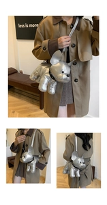 Detail of silver French Bulldog shaped crossbody bag with metallic finish and stud collar