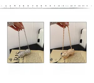 Detail of peanut shaped mini metal crossbody bag in gold and silver plating