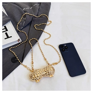 Mini gold peanut shaped metal bag with crossbody bead chain and realistic texture