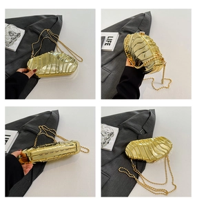 Detail views of gold evening clutch bag with wavy texture and detachable bead chain