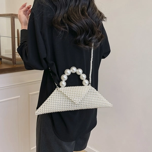 Elegant white pearl woven triangle handbag with shoulder strap for beach and summer weddings