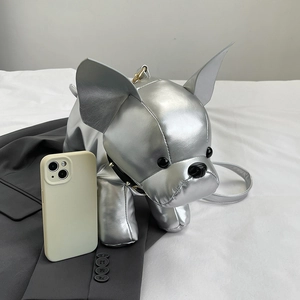 Creative silver French Bulldog crossbody bag with metallic finish and studded collar detail