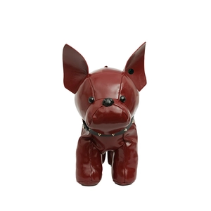 Quirky burgundy leather bulldog crossbody bag with a studded collar on a white background