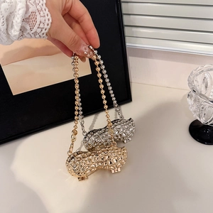 Creative peanut-shaped mini crossbody bag with metallic shell and beaded chain