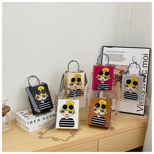 Detailed view of fashionable printed box bags with cartoon girl art in six colors