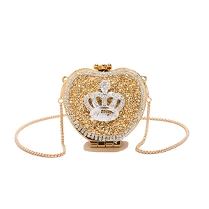 Sparkly gold heart-shaped acrylic evening bag with crystal rhinestones and crown detail