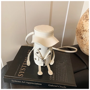 Detailed view of creative white mini bucket bag with personified jacket design details