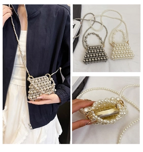 Detail of mini pearl woven bag showing silver and cream colors with inner capacity
