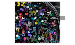 Detailed view of shimmering sequin texture on a stylish women's chain bucket bag