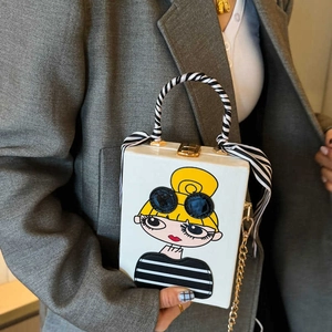 Chic white box bag featuring a fashion girl print and striped scarf wrapped handle