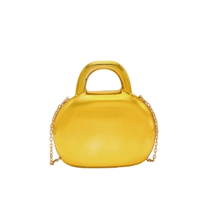 Glossy gold acrylic shell handbag with round handle and detachable metal chain strap