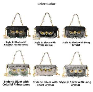 Macro view of six owl evening bags with rhinestones, tassels, and pearl handles