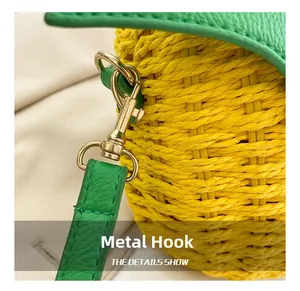 Detailed close-up of the lemon yellow woven texture and premium gold metal hardware hook
